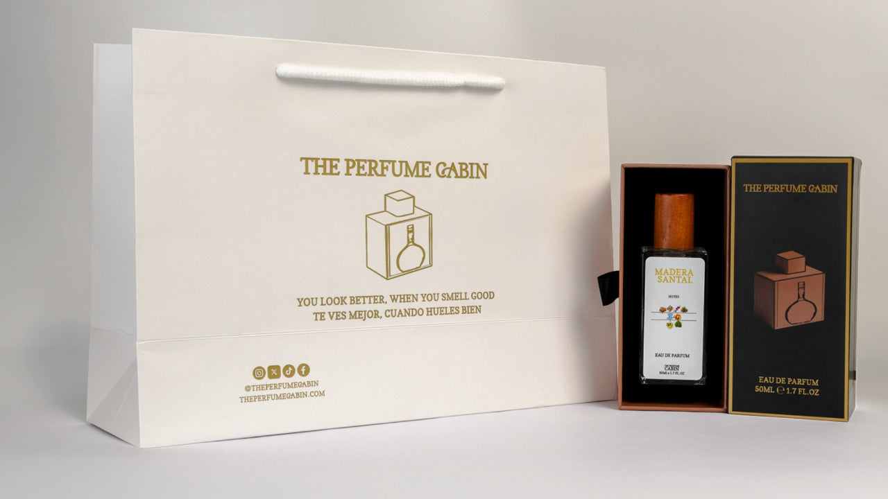 THE PERFUME CABIN BAG AND PERFUME MADERA SANTAL ON THE SIDE WITH THE BOX 